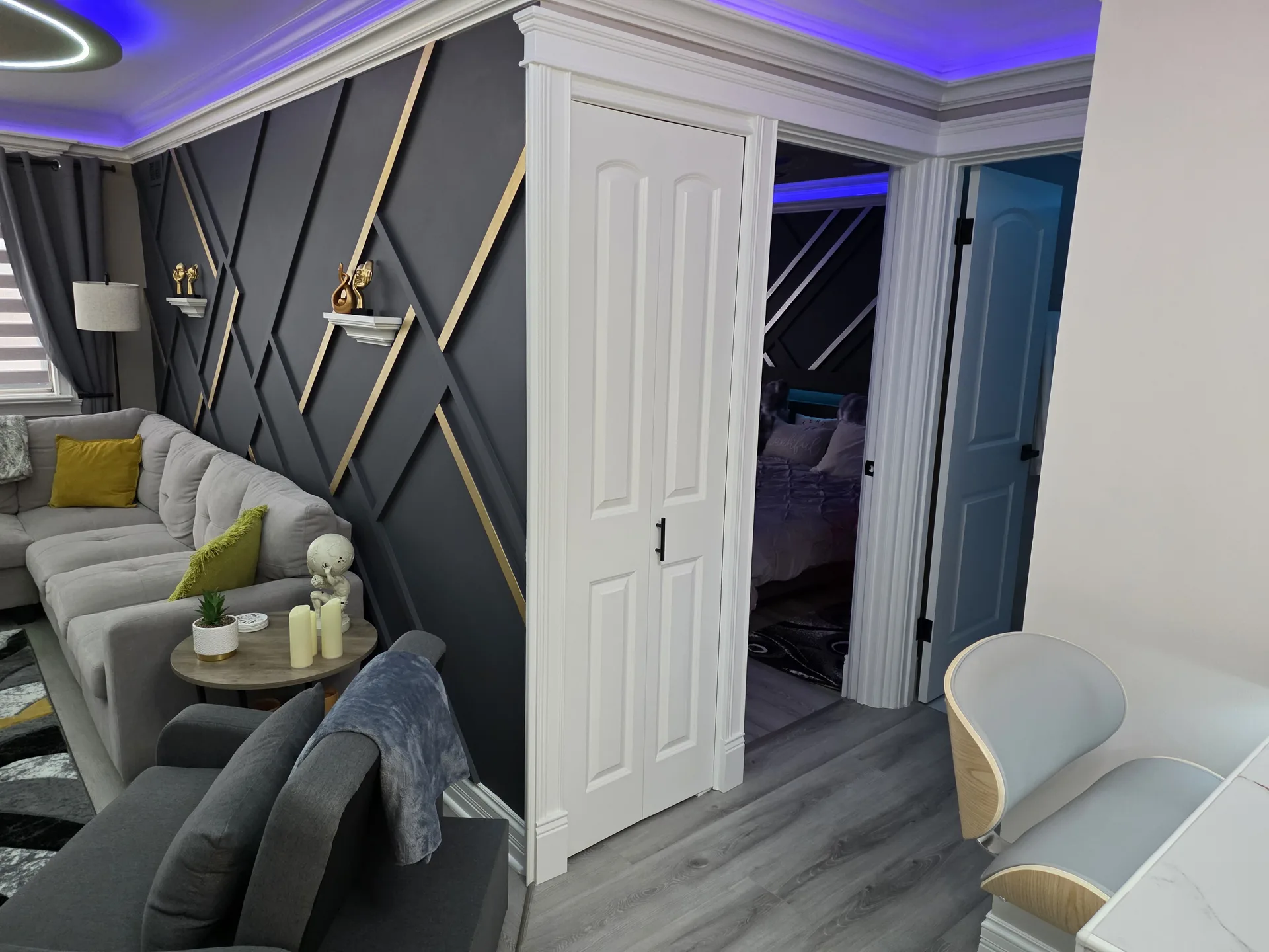 Accent wall black gold shelving