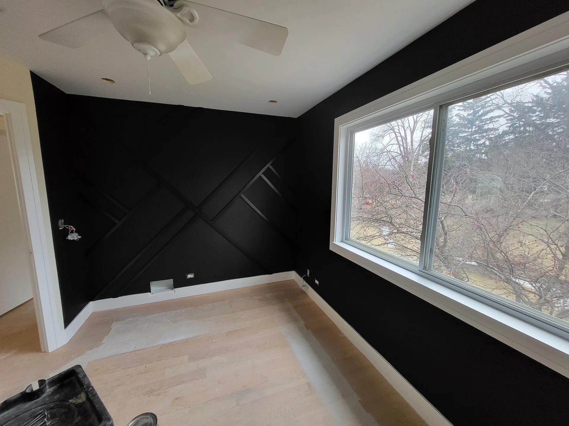 Corner detail of the geometric accent wall