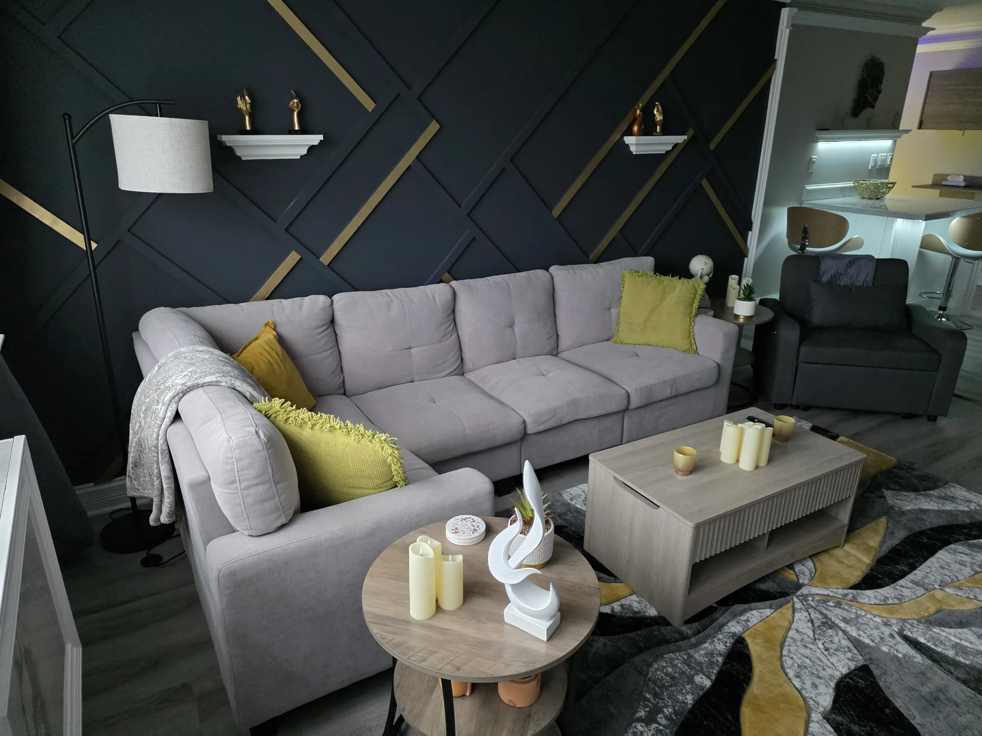 Slat accent wall black gold living room