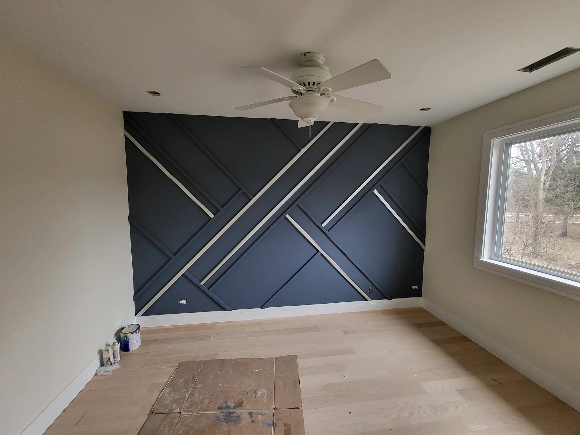 Slat accent wall navy silver room