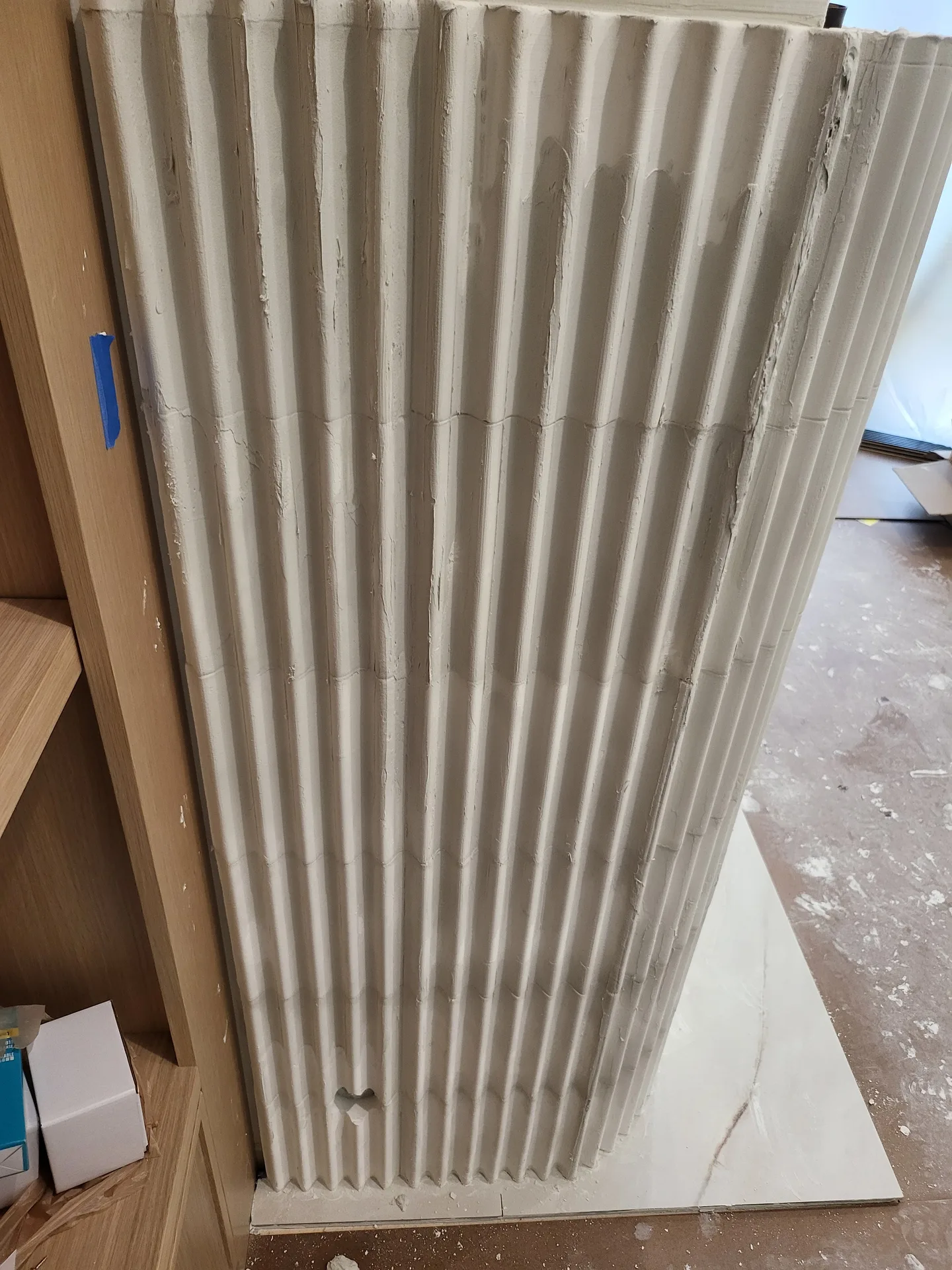 Fluted fireplace surround panel detail