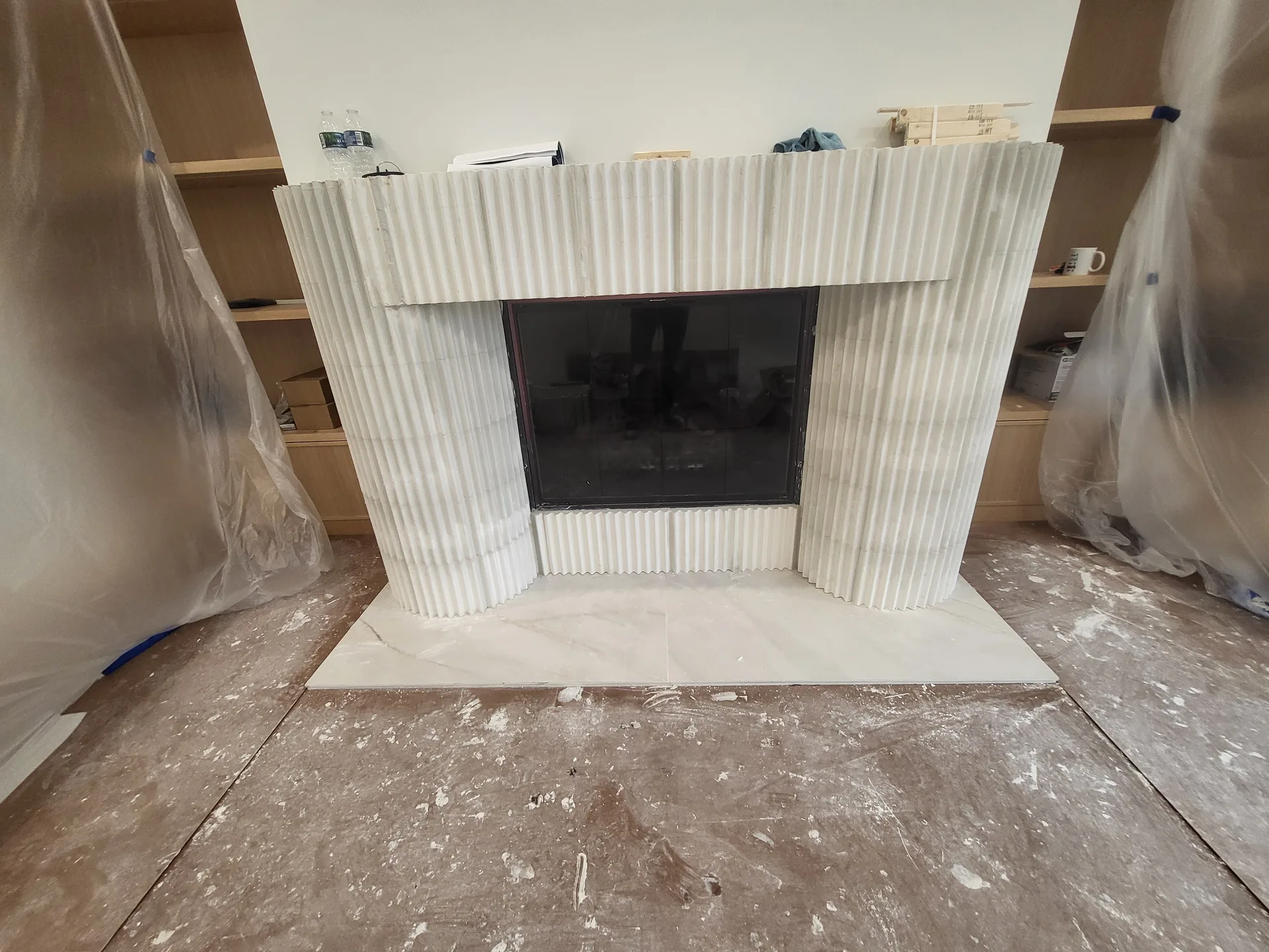 White fluted fireplace surround