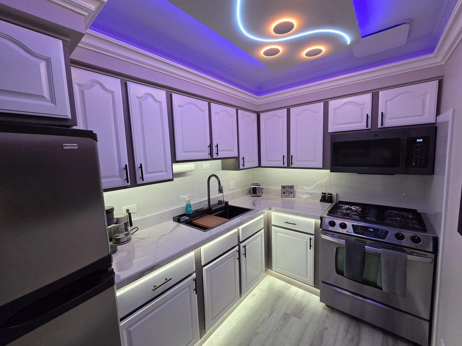 LED kitchen white cabinets marble