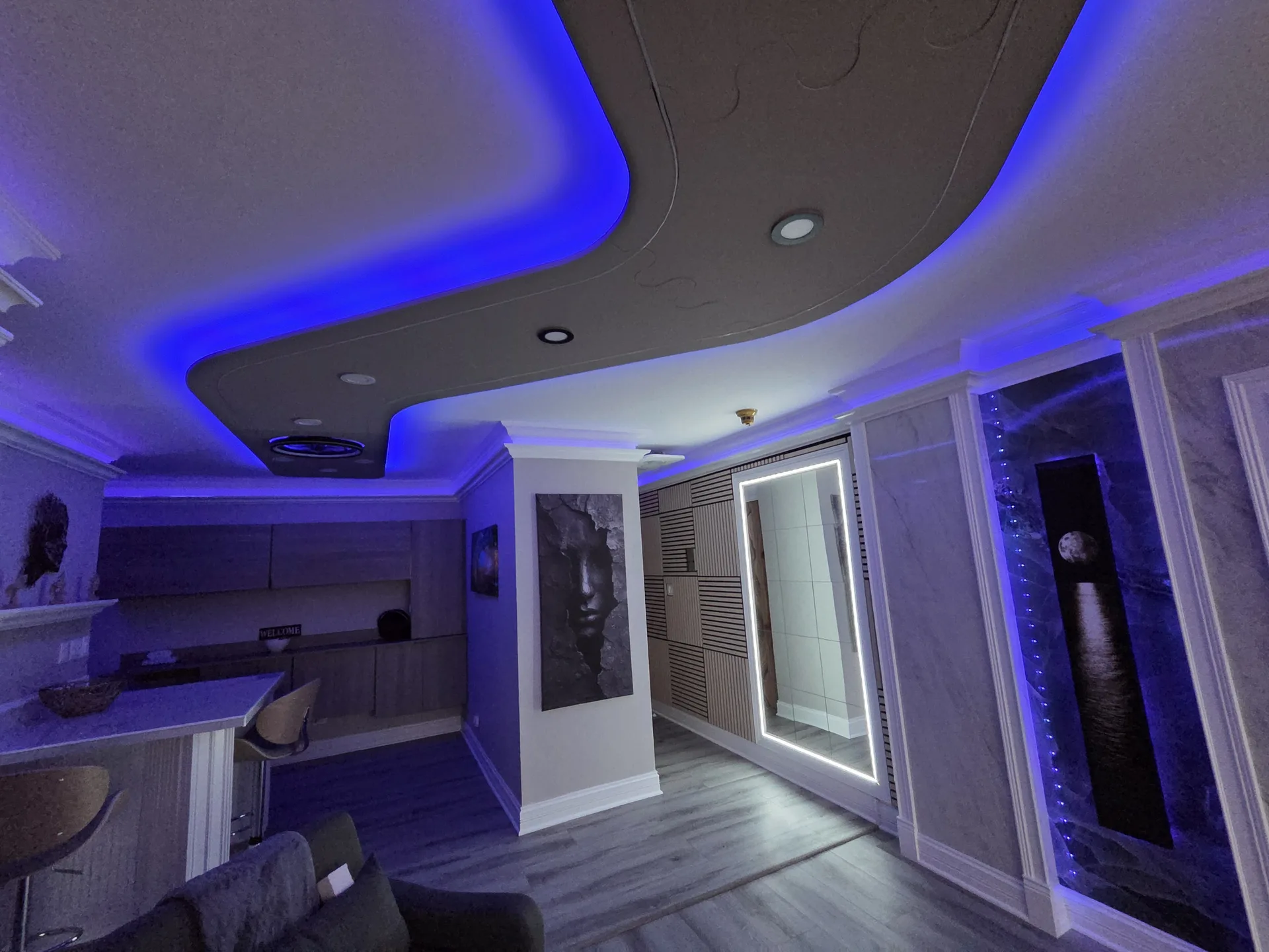 Living room with integrated LED ceiling lighting