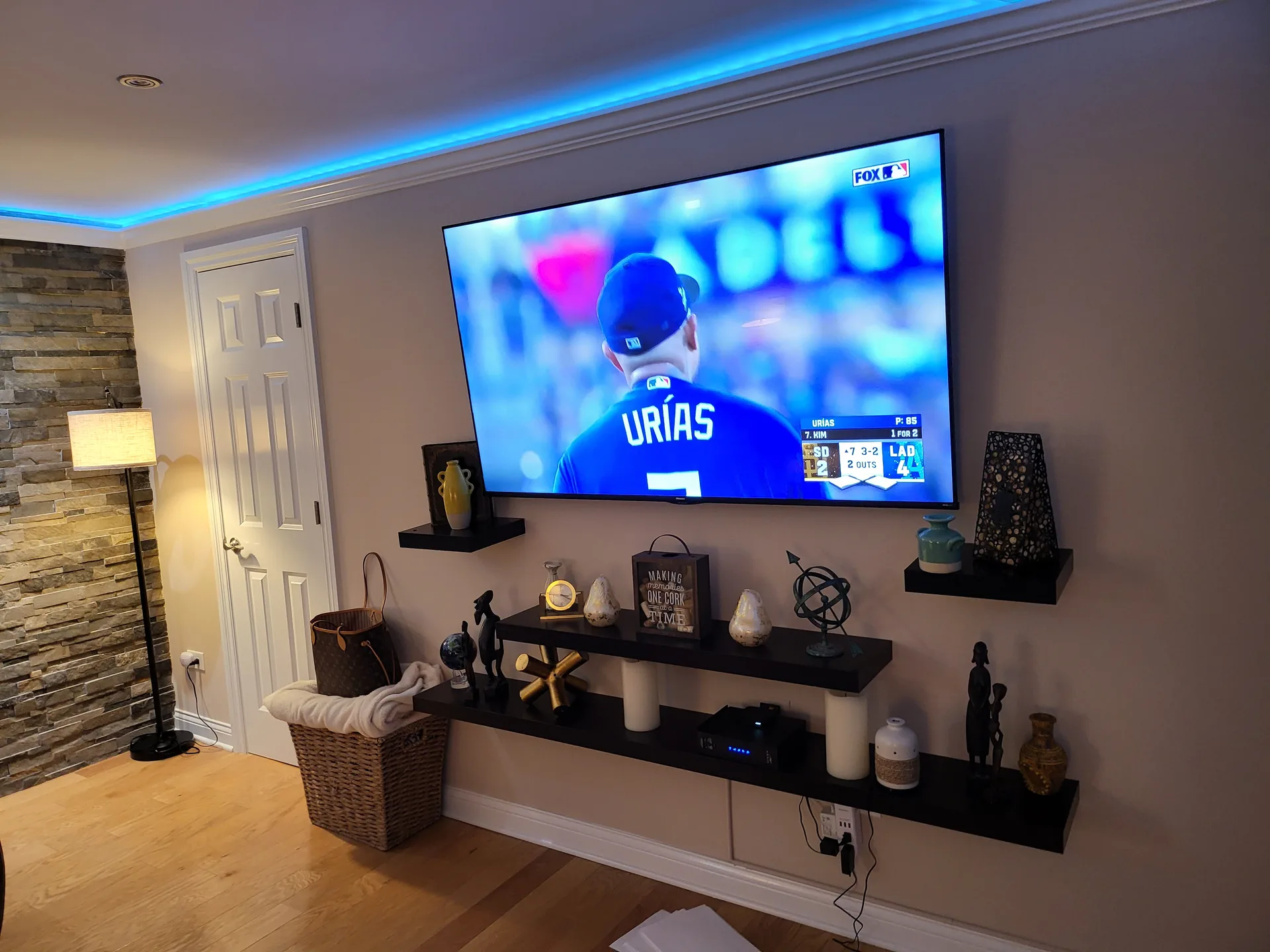 Lounge TV wall blue cove lighting