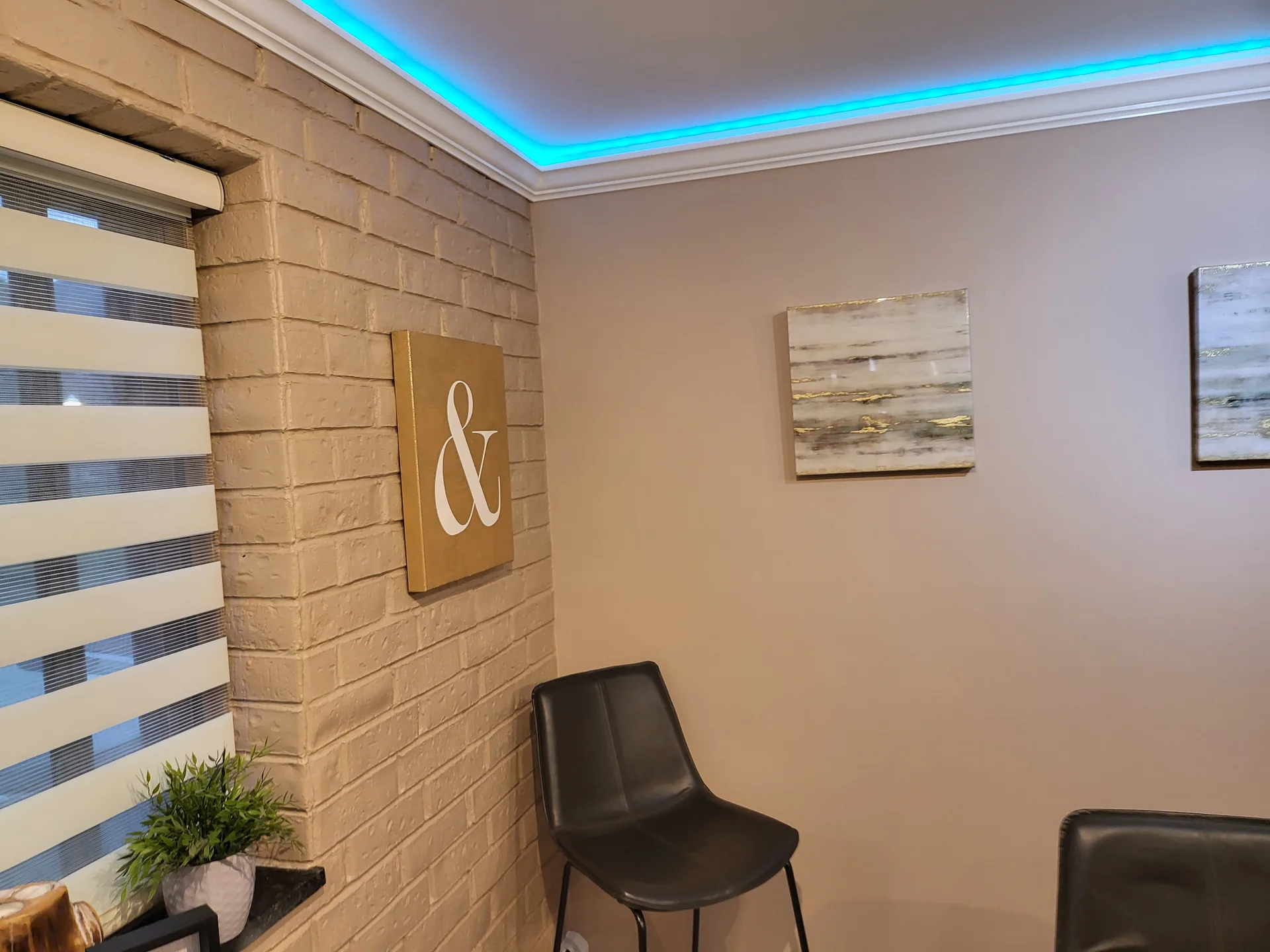 RGB cove lighting dining brick wall